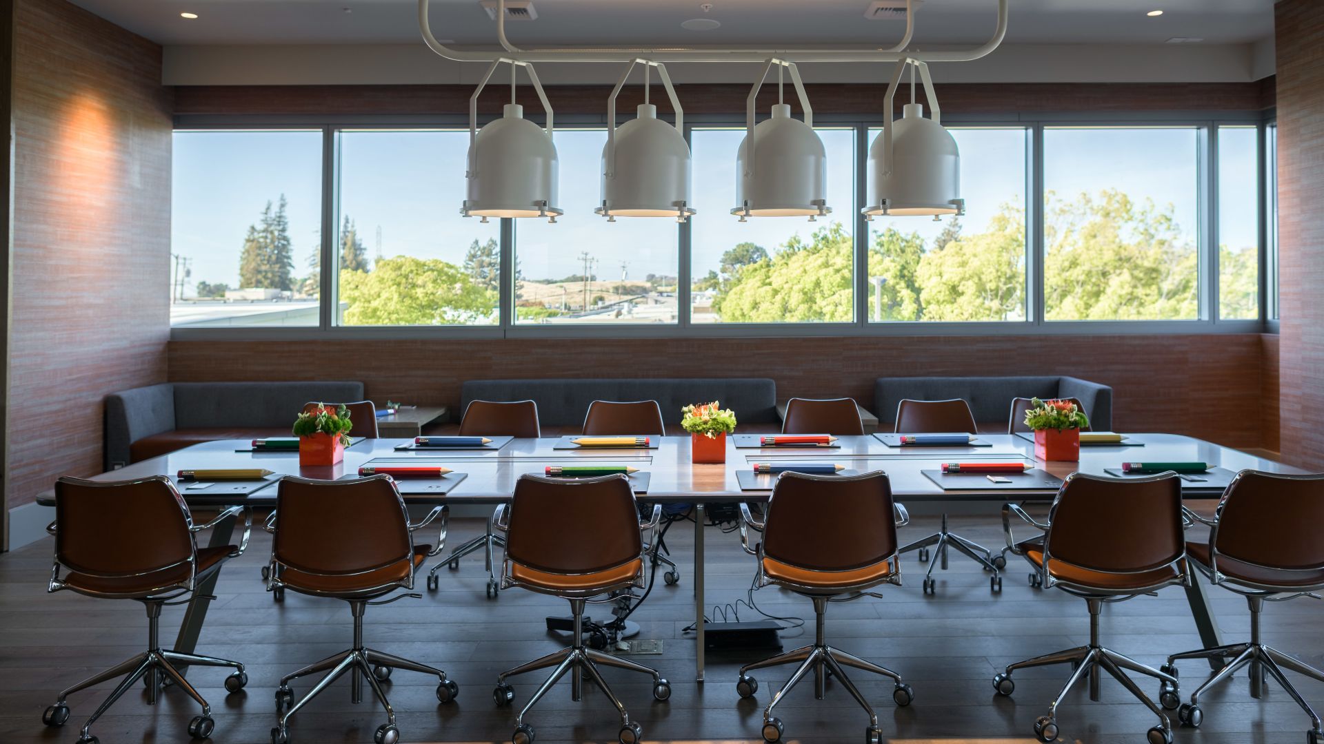 A Room With A Table And Chairs